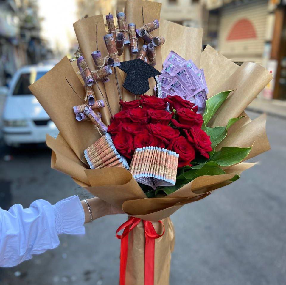 تنسيقة تخرج ورد و مبلغ 200 الف